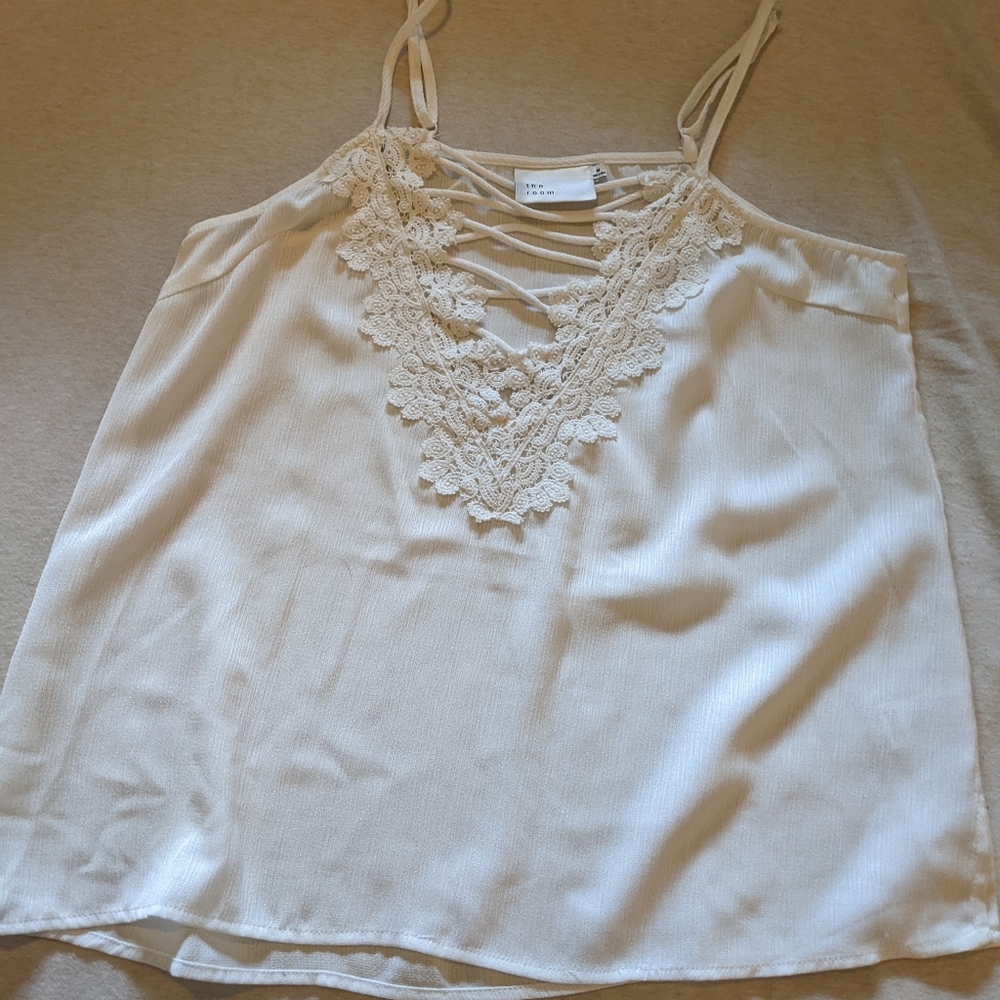 Brand new white criss cross and lacy middle top